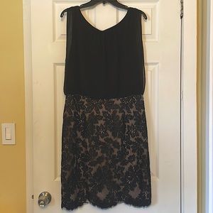 NWOT & dry cleaned Calvin Klein size 12 black cocktail dress. Lace detailing.